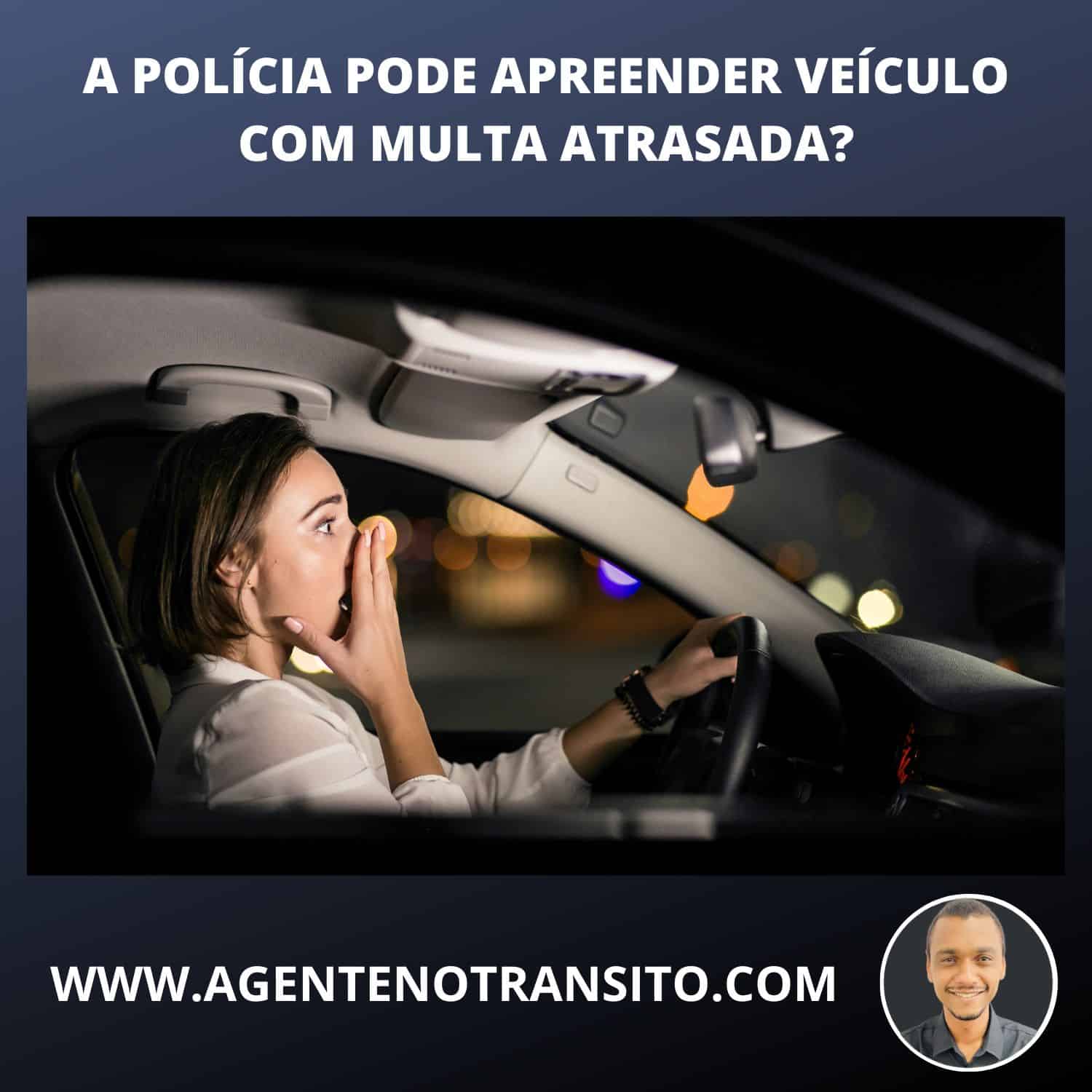 Pode apreender veículo com multa vencida? Imagem lateral do interior de um veículo, onde uma mulher está com uma das mãos no rosto em expressão assustada, como se estivesse vendo uma blitz policial adiante.